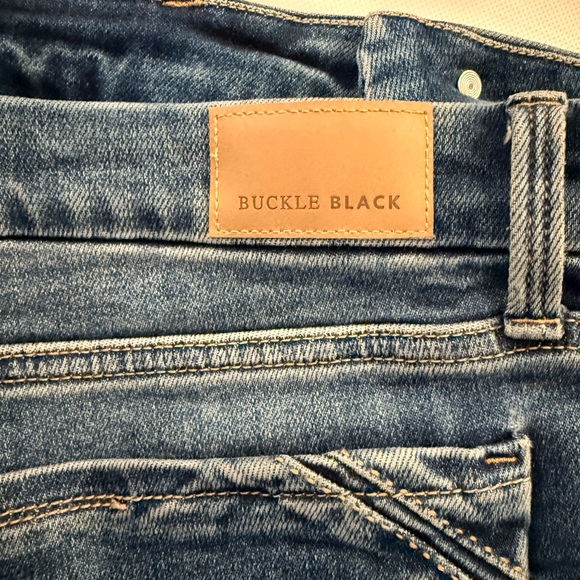 Buckle Distressed Flare Jeans - Picture 7 of 10